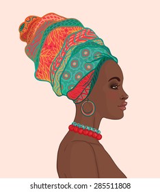 Portrait Of Beautiful African Woman In Turban (profile View)