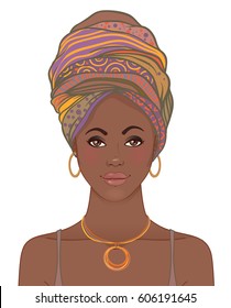 Portrait of beautiful African woman in turban. Tribal style fashion. Native Africa inspired.  