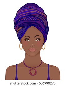 Portrait of beautiful African woman in turban. Tribal style fashion. Native Africa inspired.  