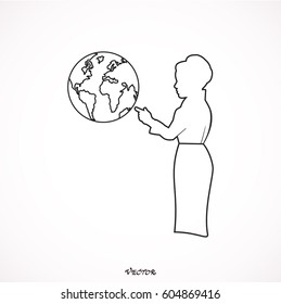 Portrait of beautiful casual woman pointing at globe against white background 