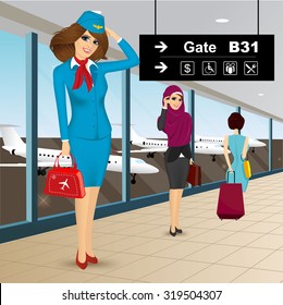 portrait of beautiful friendly air hostess saluting in an airport 