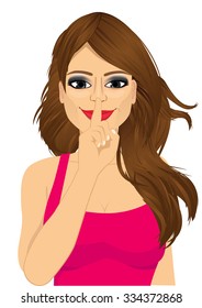 portrait of beautiful friendly girl making silence or secret hand gesture with finger on her lips