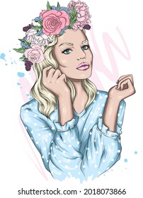 Portrait of a beautiful woman in a floral wreath. Fashion and style, clothing and accessories.