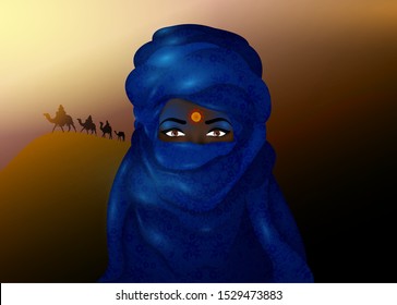Portrait of beautiful woman wearing blue tuareg scarf. Young girl in national costume of African tribal nomads. Berber women’s in blue ethnic Turban and ancient clothes. African desert background 