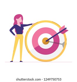 Portrait of a business woman holding a target. Concept of time management.
