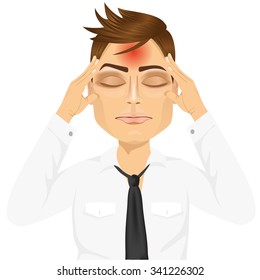 portrait of businessman touching his temples suffering a terrible and painful headache isolated over white background