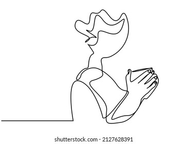 portrait of calm woman holding coffee cup