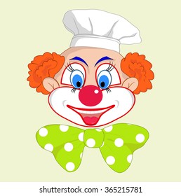Portrait of a cheerful clown cook with bow