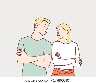 Portrait of a cheerful young couple standing with arms folded and looking at each other. Hand drawn style vector design illustrations.