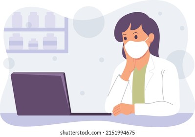 portrait of a doctor using his laptop for work