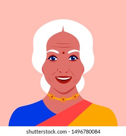 Portrait of an elderly Indian woman in a sari. Female face. Avatar for social networks. Grandmother’s head. Vector flat illustration