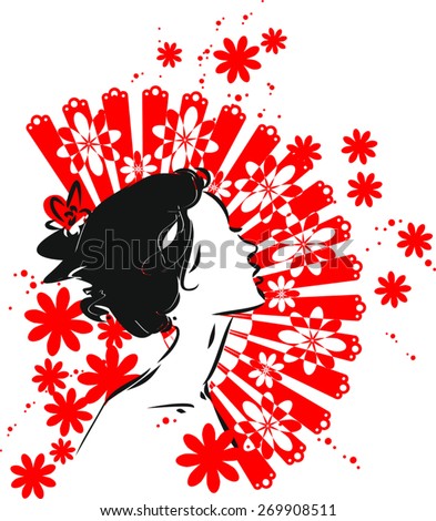 Portrait of flamenco dancer with a fan
