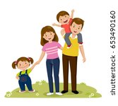 Portrait of four member happy family posing together. Parents with kids