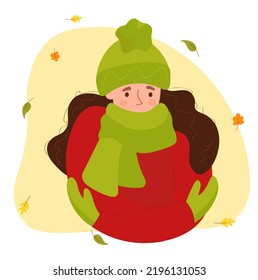 Portrait of a frozen girl, a woman in a hat, wrapped up to her nose with a warm scarf, against the background of autumn leaves. Cartoon character in flat style for autumn design, decor.Vector.