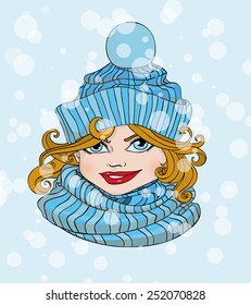 Portrait of funny girl in a blue scarf and a hat on a background of falling snow