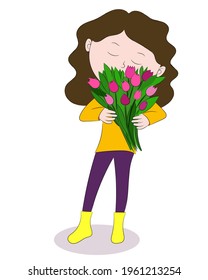 Portrait of a girl with a bouquet of tulips in her hands
