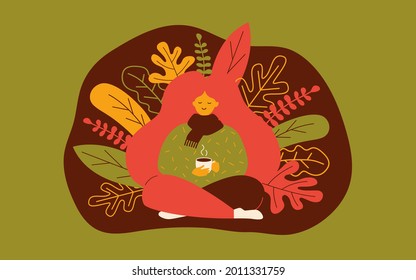 portrait of a girl wearing sweater and scarf, sitting in cross-leg pose and holding mug of coffee or cocoa in her hands. vector flat illustration of smiling woman and autumn leaves