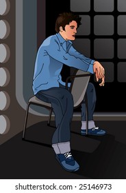 Portrait of a handsome boy sitting on a chair