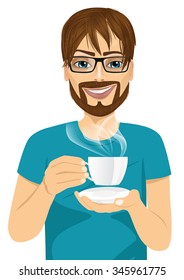 portrait of handsome young hipster man drinking hot coffee or tea isolated on white background