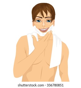 portrait of handsome young man applying shaving cream foam on face isolated on white background