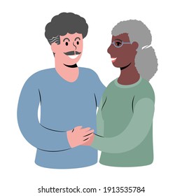 A portrait of a happy elderly interracial couple embracing each other. 