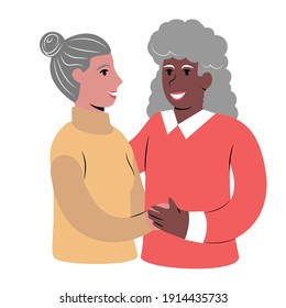 A Portrait Of A Happy Elderly Same Sex Lesbian Interracial Couple Embracing Each Other. 