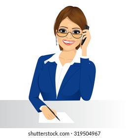 portrait of happy smiling female customer support phone operator with glasses taking note isolated over white background