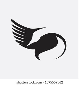 portrait of a little bird tit flying wide spread wings and flushing feathers on black isolated background