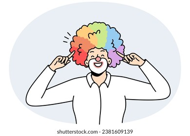 Portrait of male clown pointing with index fingers at his voluminous multicolored hairstyle, wig. LGBT smiling man with rainbow hairs. Gay pride. Front view. Vector minimalistic modern design.