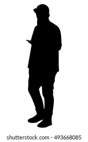 portrait of modern young man with mobile phone in the street