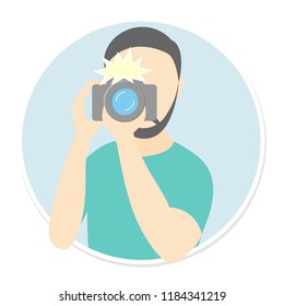 Portrait of a photographer with a camera.