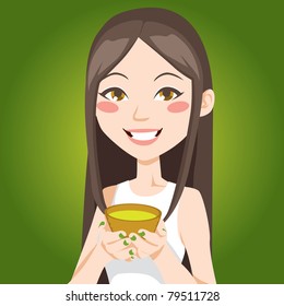 Portrait Of A Pretty Asian Woman Drinking A Cup Of Green Tea