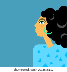 Portrait in profile of a Latin girl with flowing curly hair with a turquoise earring in her ear and wearing a blue blouse with Memphis style pattern on a blue background.