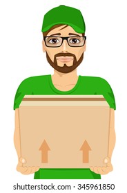 portrait of sad young delivery man holding and carrying a cardbox