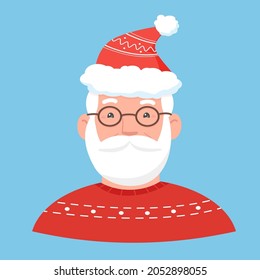 Portrait of Santa Claus with red sweater and hat