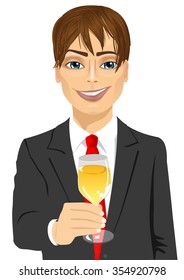 portrait of successful young handsome businessman toasting with a glass of champagne