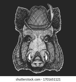 Portrait of wild hog, boar, pig. Oktoberfest. Tirol traditional hat. Beer festival. Face of brave animal.