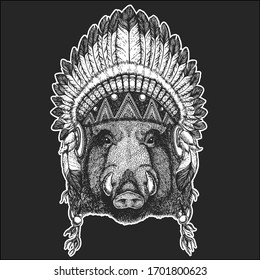 Portrait of wild hog, boar, pig. Indian tribal traditional headdress with feathers. Face of brave animal.