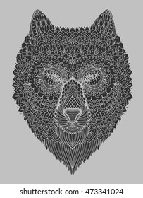 Portrait of a wolf. The dog's head. Line art. Black and white drawing by hand. Stylized. Decorative. Tattoo. Indian wolf. Wolf decorated with feathers.