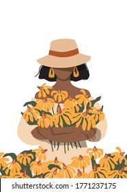Portrait of a woman with a bouquet of summer flowers. Lovely tanned girl in a straw hat