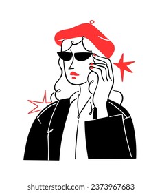 Portrait of a woman with glasses and a phone