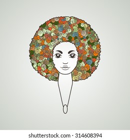 Portrait of a woman with luxuriant hair in the style of an African. Vector. The patterns in the hair.