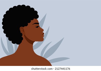 Portrait of a young African woman in profile. Diversity and ethnicity Avatar of a dark - skinned girl with afro curls . The face of a model. Side view. Vector flat illustration