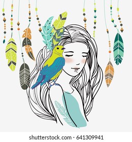 Portrait of young beautiful woman with ethnic feathers in hair and with a bird on her shoulder
