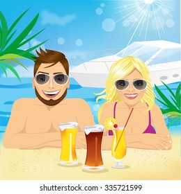 portrait of young happy couple enjoying beach holiday with coctails and beer