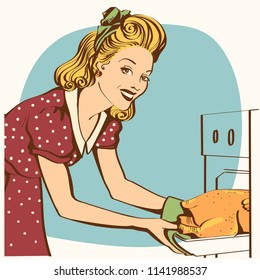 Portrait of Young housewife in retro red dress cooking roasted chicken in an oven.Retro kitchen room interior