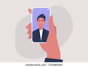 A portrait of a young male character on a mobile screen, millennial lifestyle, gadgets, online video call