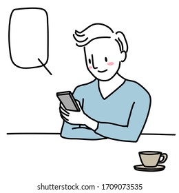 Portrait of young man texting on mobile phone. Happy man sitting at cafe and reading text message. Cute man using phone chatting online while sitting at coffee shop.