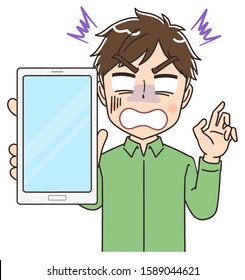 Portrait of a young man wearing a green shirt.He has a smartphone in his hand.And he is surprised.