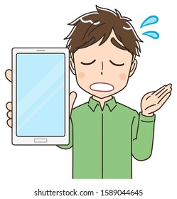 Portrait of a young man wearing a green shirt.He has a smartphone in his hand.And he has a sad expression.